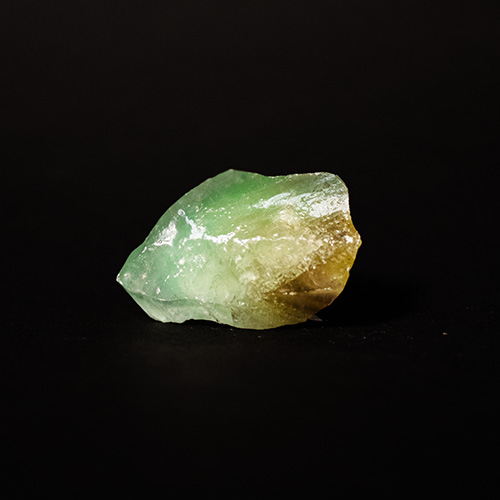 Glossy green rock smooth with edges